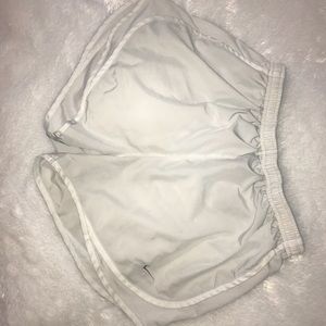 White nike running shorts